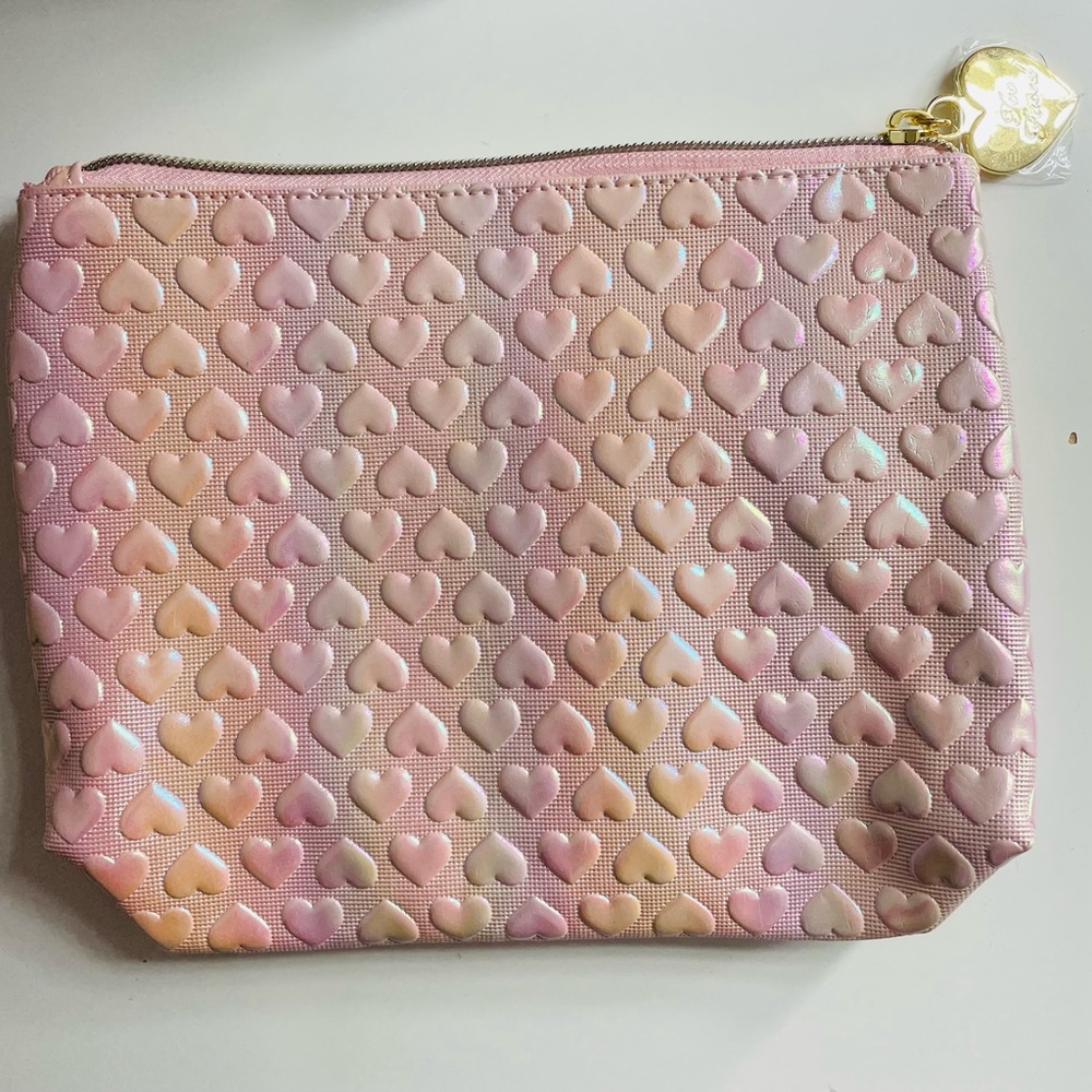 Too Faced makeup bag with mascara and lip plumper
